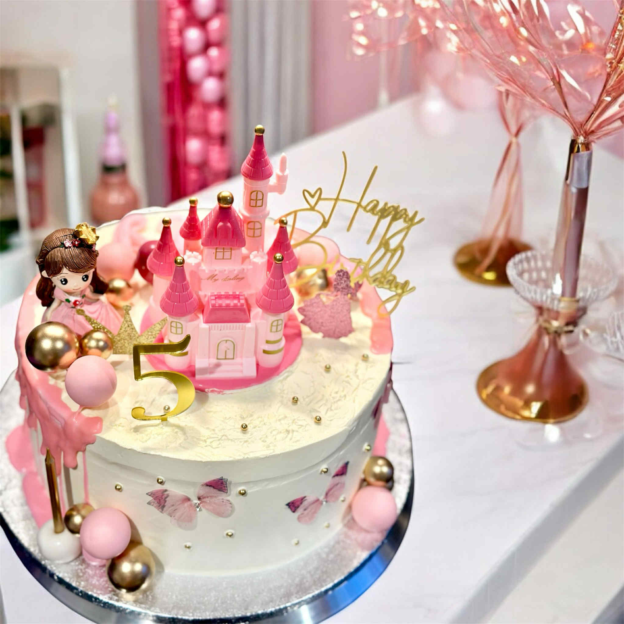 Pink Princess Castle Biscoff Cake